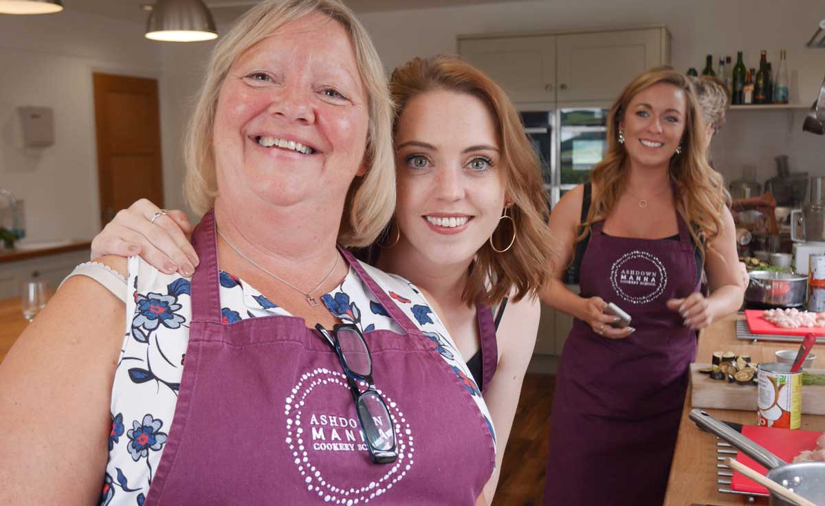 people in a cooking class enjoying themselves